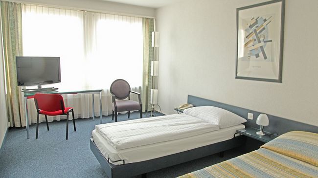 Hotel Comedie Genebra Quarto foto